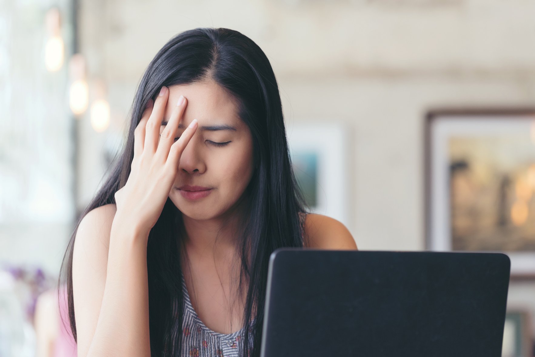 Asian woman frustrated on his work and out of control.